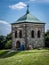 Stone bell tower at the Holy Cross sanctuary in Swietokrzyskie Mountains, Poland. .Â 